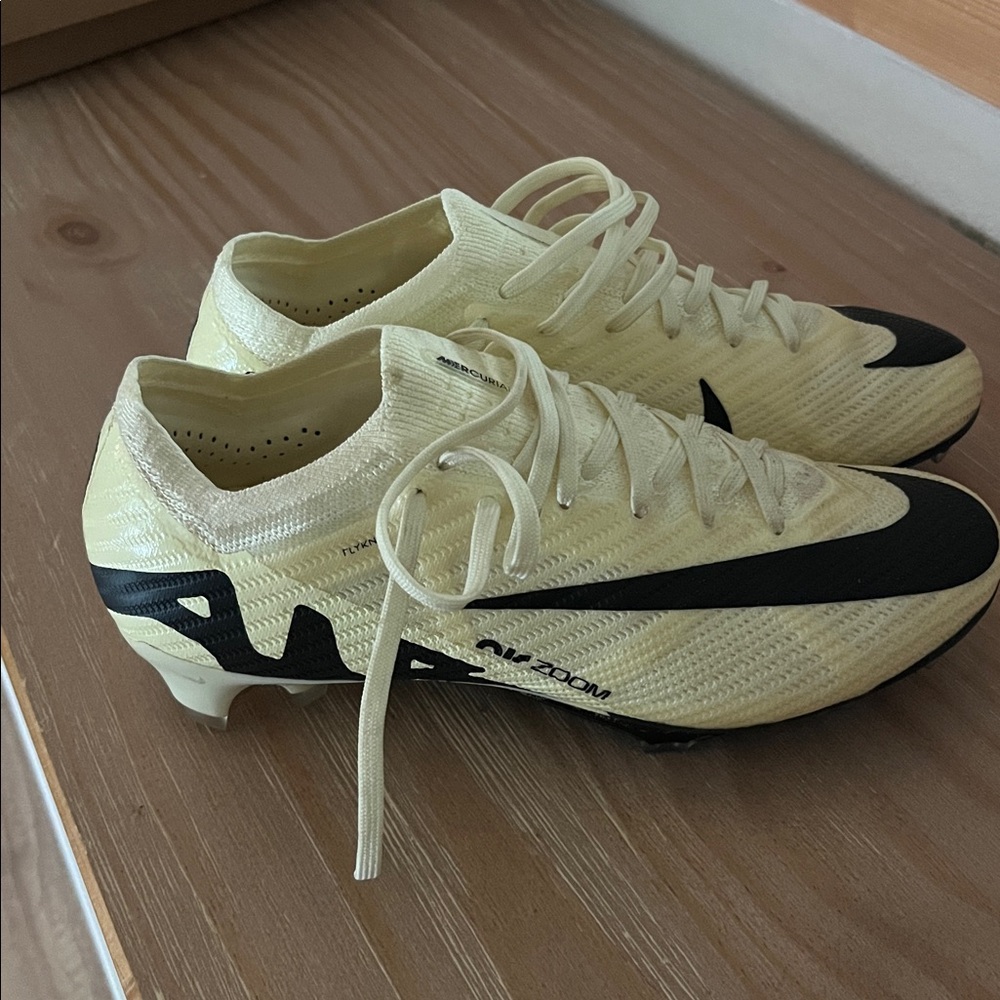 Nike Mercurial Zoom Cleats in light yellow and Black